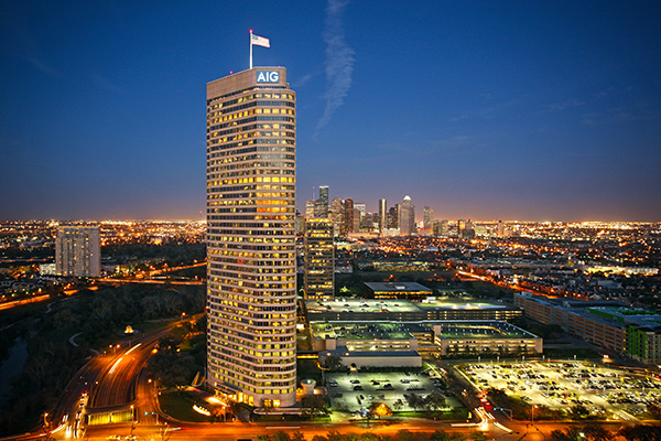 The AIG headquarters located in Houston, TX at sunset.