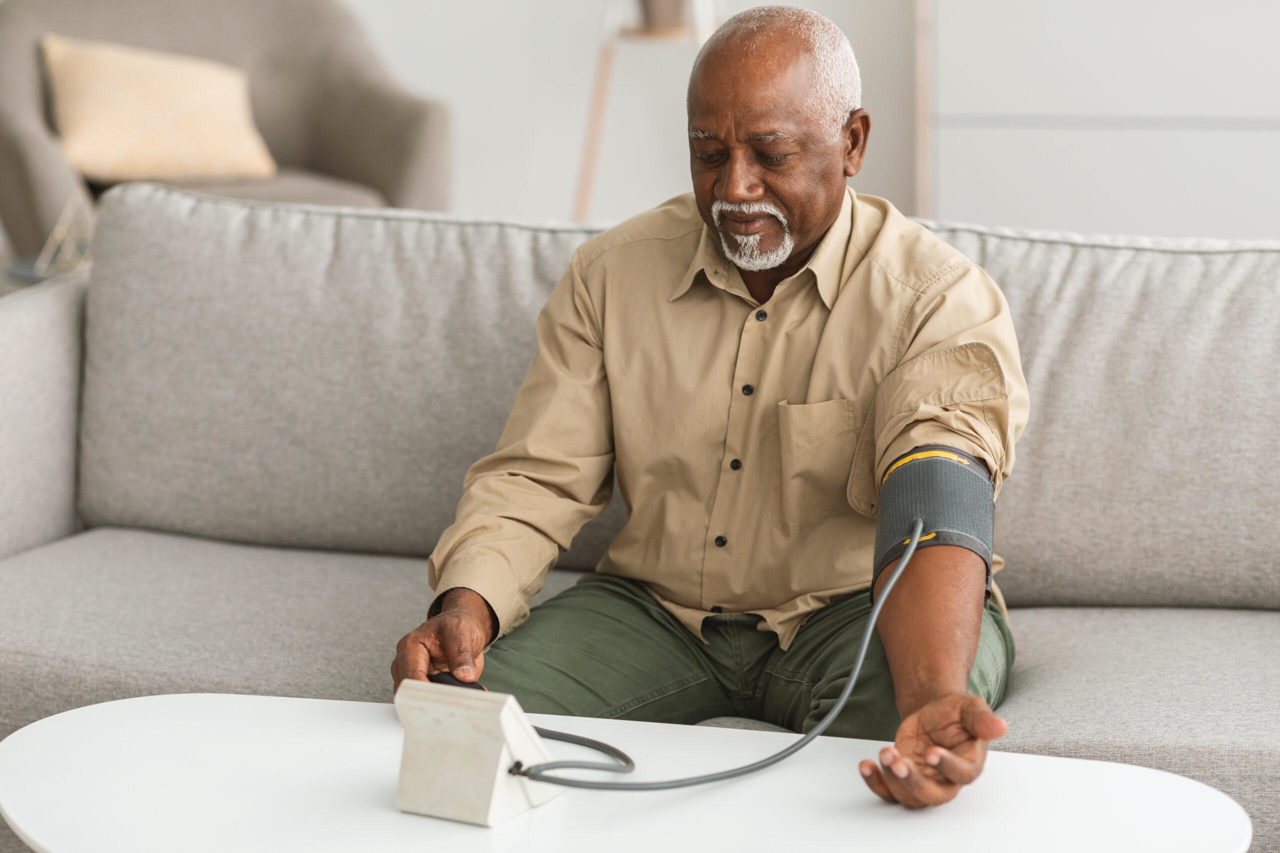 Man checking blood pressure