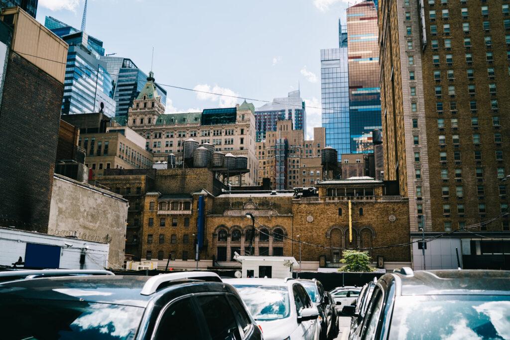 A traffic jam with the New York skyline in the background.