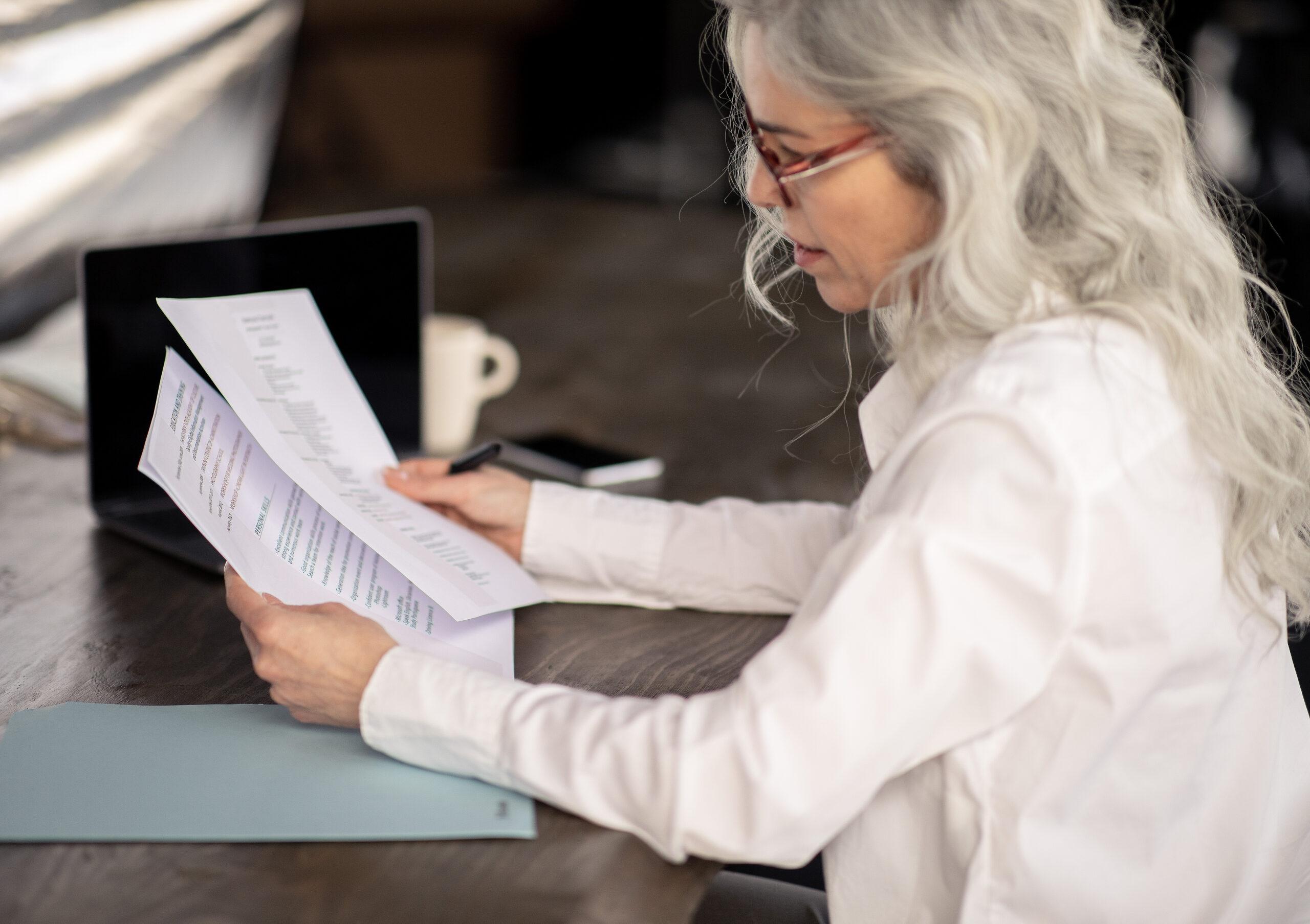 Woman looking at paperwork