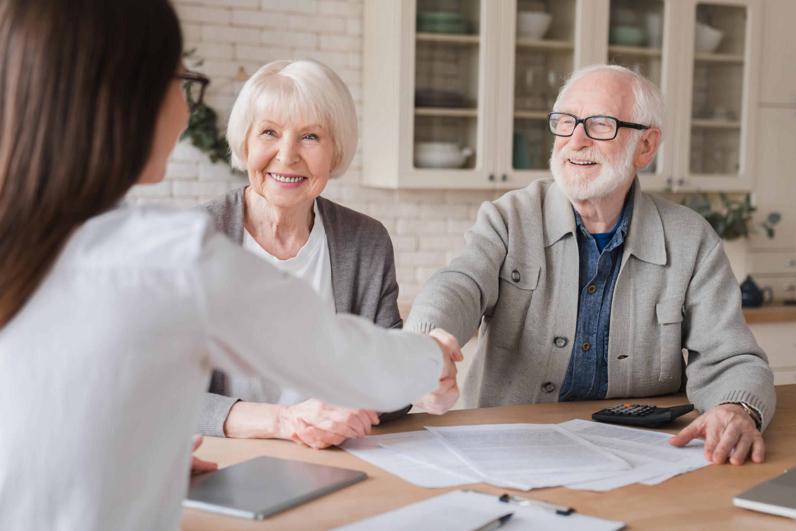 Clients signs financial insurance, pension, startup, dealing handshake agent lawyer, agreement