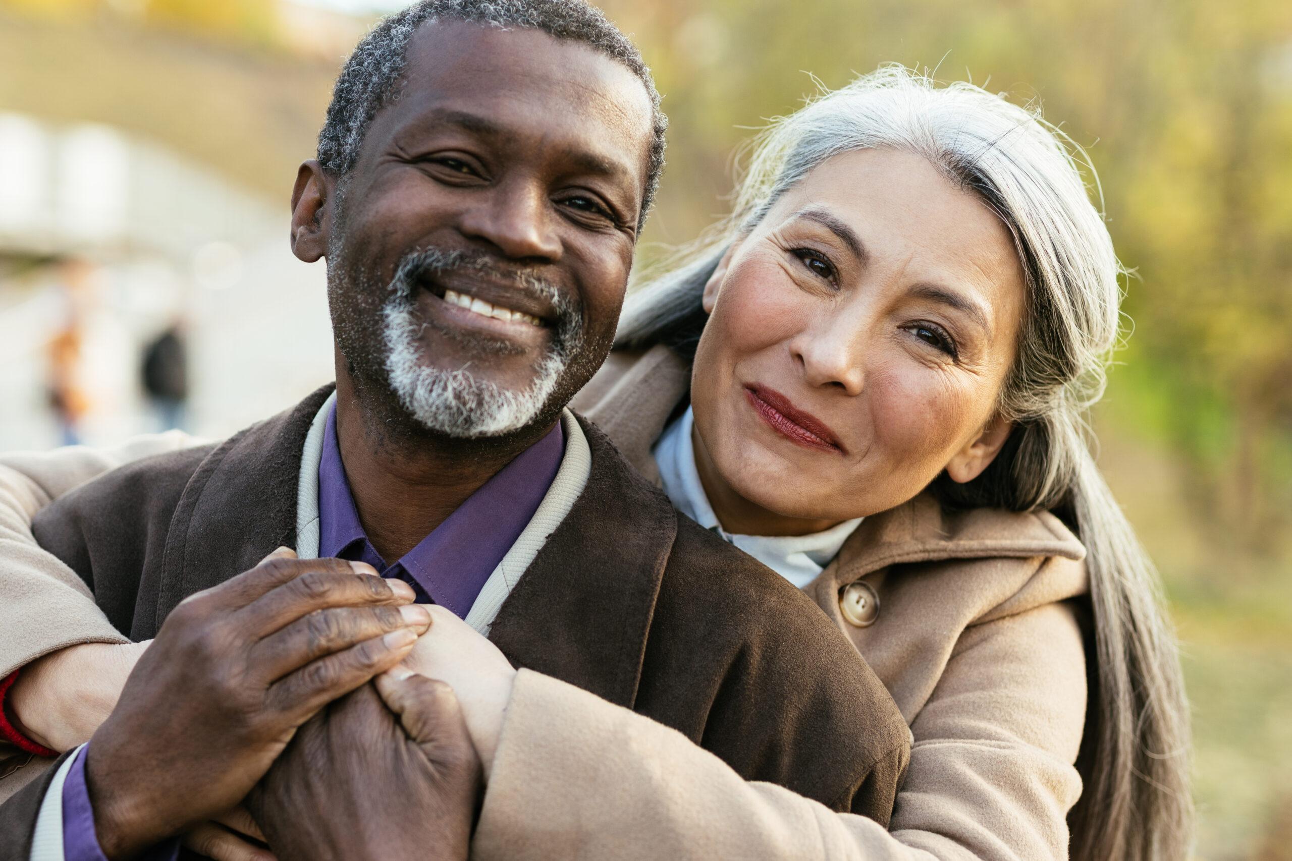 Senior couple posing for photo