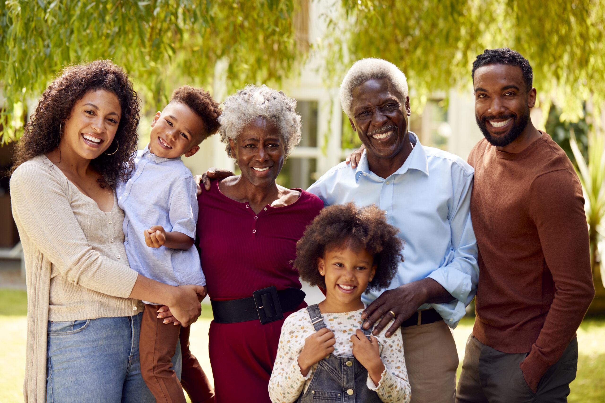 Smiling family outside