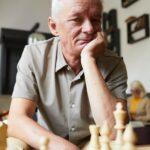 White Haired Senior Man Playing Chess