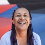 Happy african senior woman smiling on camera