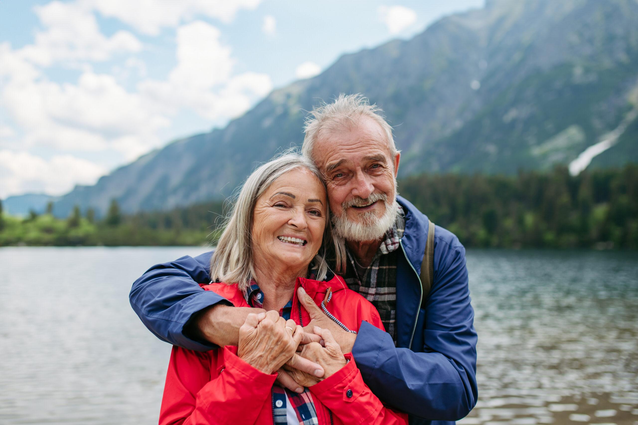 Portrait of beautiful active elderly couple hiking together