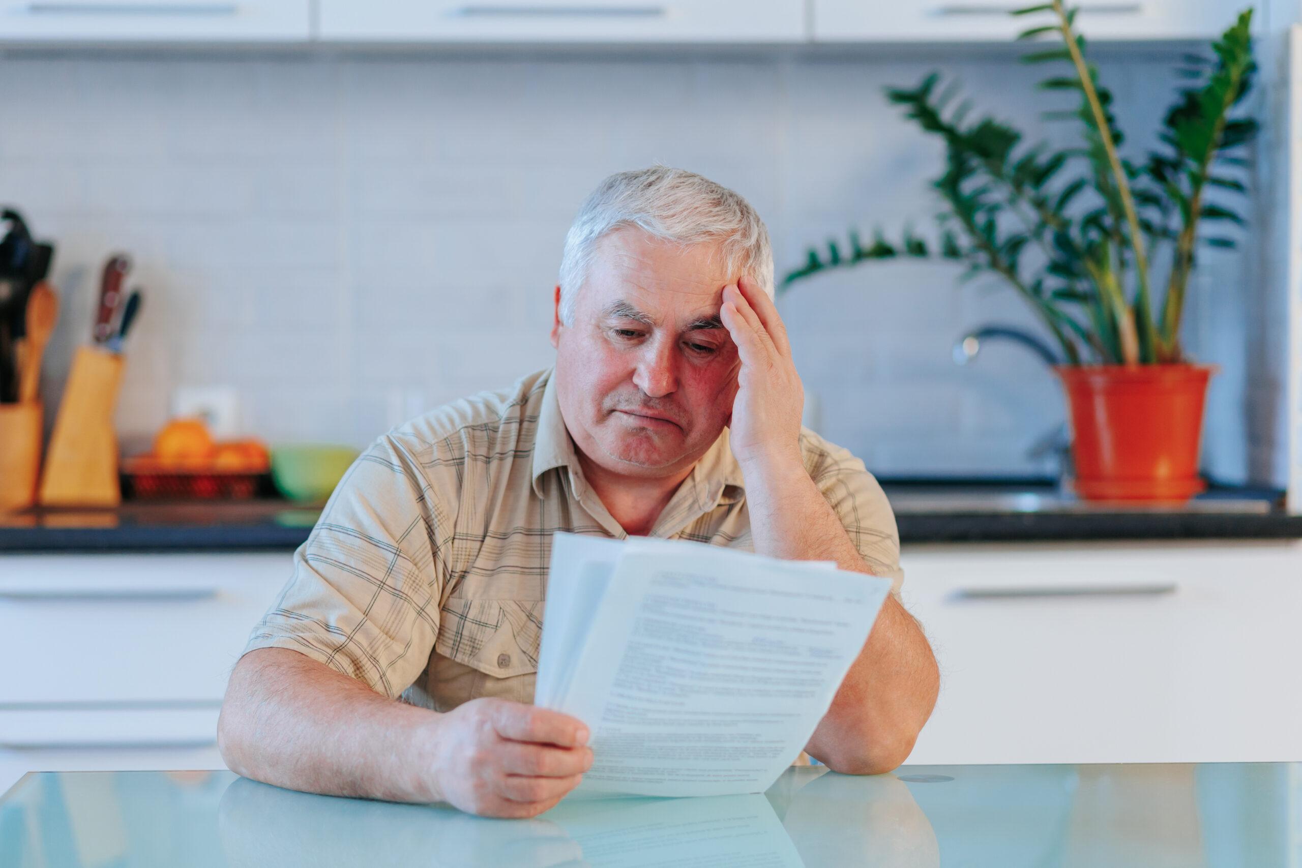 Woman looking confused reading paperwork