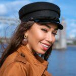 Woman smiling on bridge