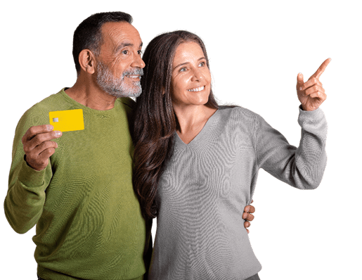 Couple embracing while holding a credit card