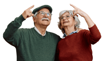 Elderly couple pointing up