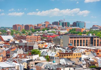 Baltimore, Maryland, USA cityscape overlooking little Italy and neighborhoods.