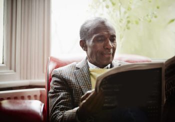 Senior man reading newspaper